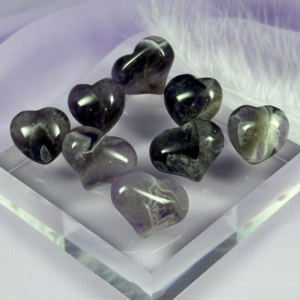One small Amethyst crystal pocket heart 6.3g-7.6g SN56225