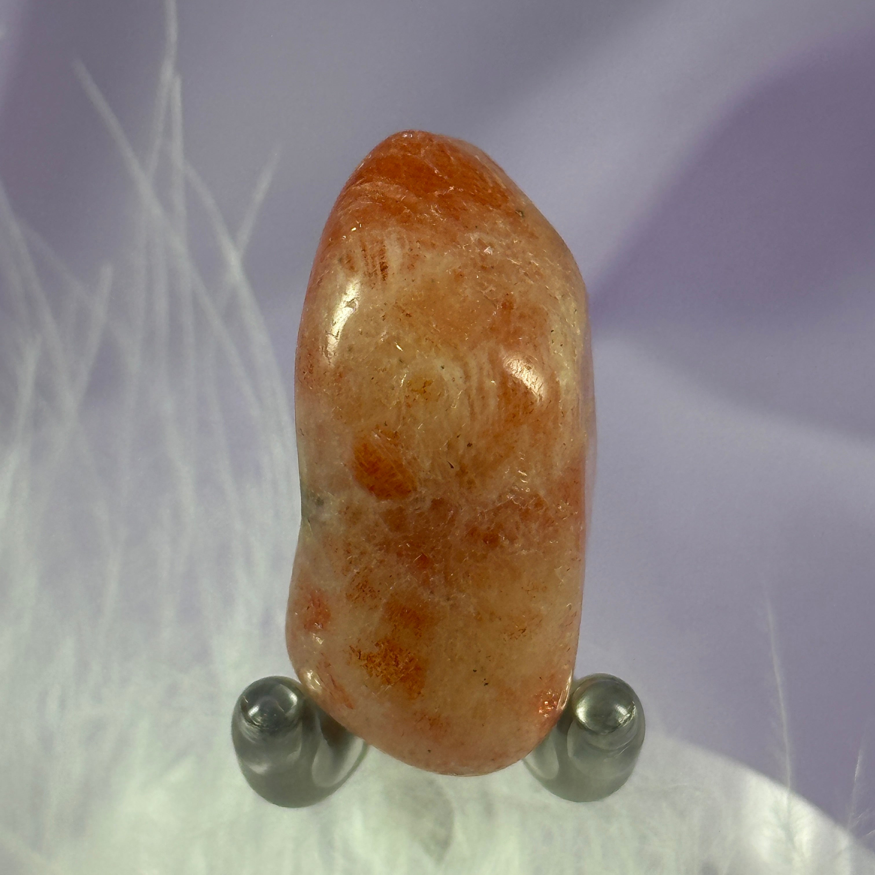 Sunstone crystal tumble stone, great flashes 12.0g SN44049