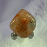 Sunstone crystal tumble stone, great flashes 10.7g SN44050