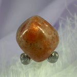 Sunstone crystal tumble stone, great flashes 10.7g SN44050